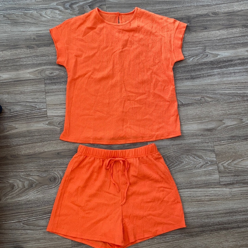 Super cute orange two piece set.
